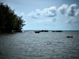 Panorama views from the coast of Cambodia near the town of Kampot on the beaches of the Nataya Resort - the bay here is very shallow as the water color shows