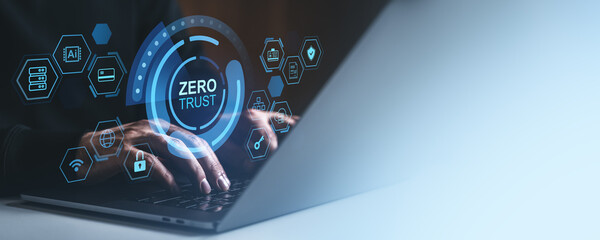 Cybersecurity zero trust concept with holographic interface on laptop.
