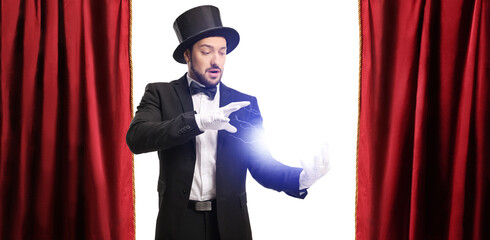 Magician performing a trick with electricity on stage