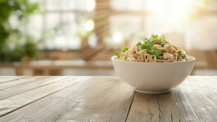 Fresh salad bowl on rustic wooden table with sunlit background, perfect for healthy meal concepts.