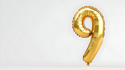 Gold number nine balloon, floating against white background.  Perfect for celebrations, announcements