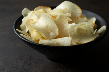 A view of a bowl of cassava chips.