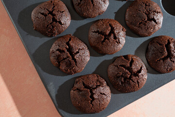 A view of a muffin pan of flax seed chocolate brownies.