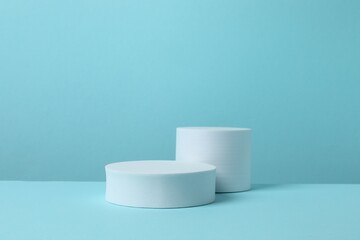 White podiums on a blue background