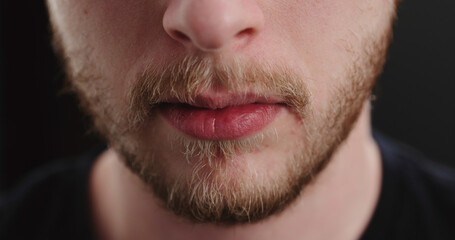 Obraz premium closeup shot of bearded man mouth