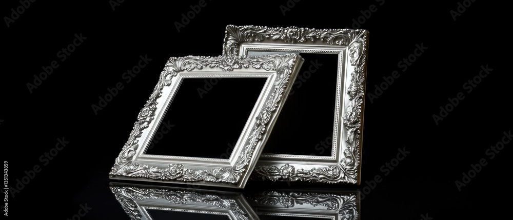 Poster a pair of silver picture frames placed on a table, ready for use