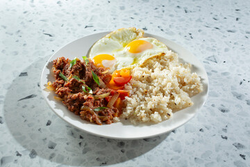A view of a corned beef breakfast plate.