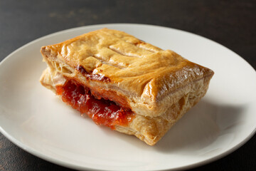 A view of a guava strudel, on a plate.