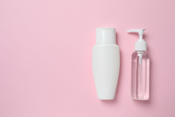 Natural cosmetic products a pink background, top view
