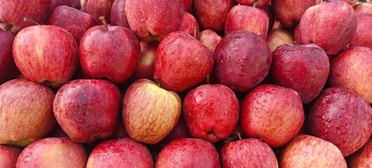 A pile of fresh red apples open sell in Indian market.