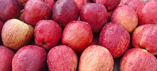 A pile of fresh red apples open sell in Indian market.