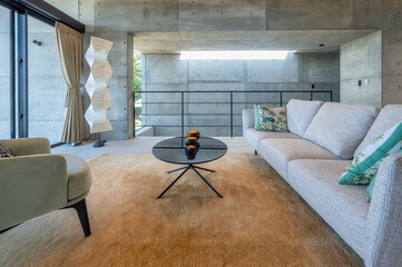 New build modern minimalist house in Okinawa, Japan, constructed of reinforced concrete and glass,...