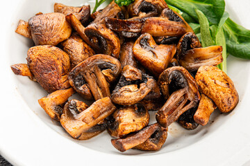 Mushrooms fried champignons vegetables dish fresh delicious gourmet food background on the table rustic food top view copy space keto and paleo diet vegetarian and vegan food