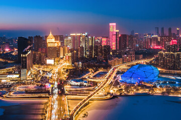Aerial View of Shengjing Theater and Hunhe Skyline Night Scene in Shenyang, Liaoning, China © Govan