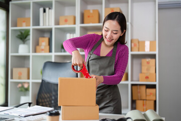 Packaging and Shipping Expertise. A smiling woman carefully sealing boxes with scissors, showcasing her skills in preparing online orders.