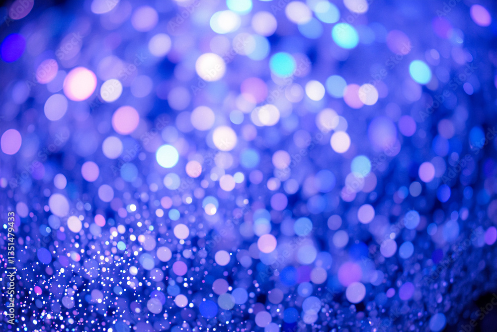 Poster a blurred blue backdrop with pink and purple highlights creates a dazzling bokeh effect. sparkling l