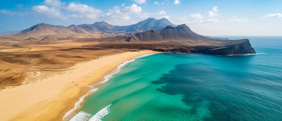Obraz premium Aerial view of serene beach and mountains lanzarote nature landscape tropical environment panoramic perspective