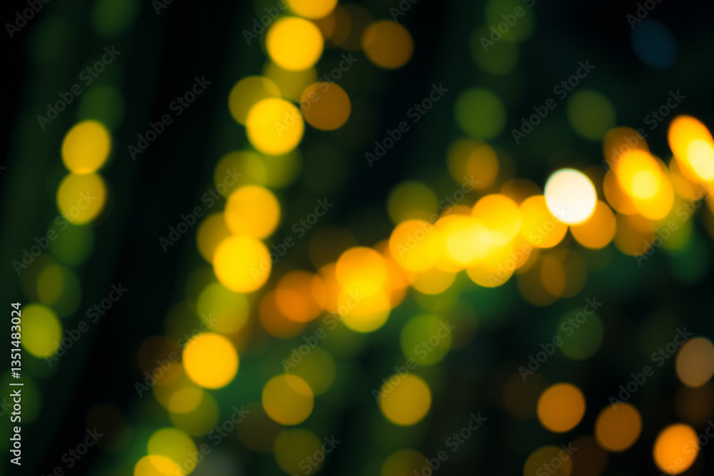 Leinwandbilder Blurred yellow lights against a dark green backdrop create a soft bokeh effect. The image evokes a warm, festive, and dreamy atmosphere with its out-of-focus circular lights.
