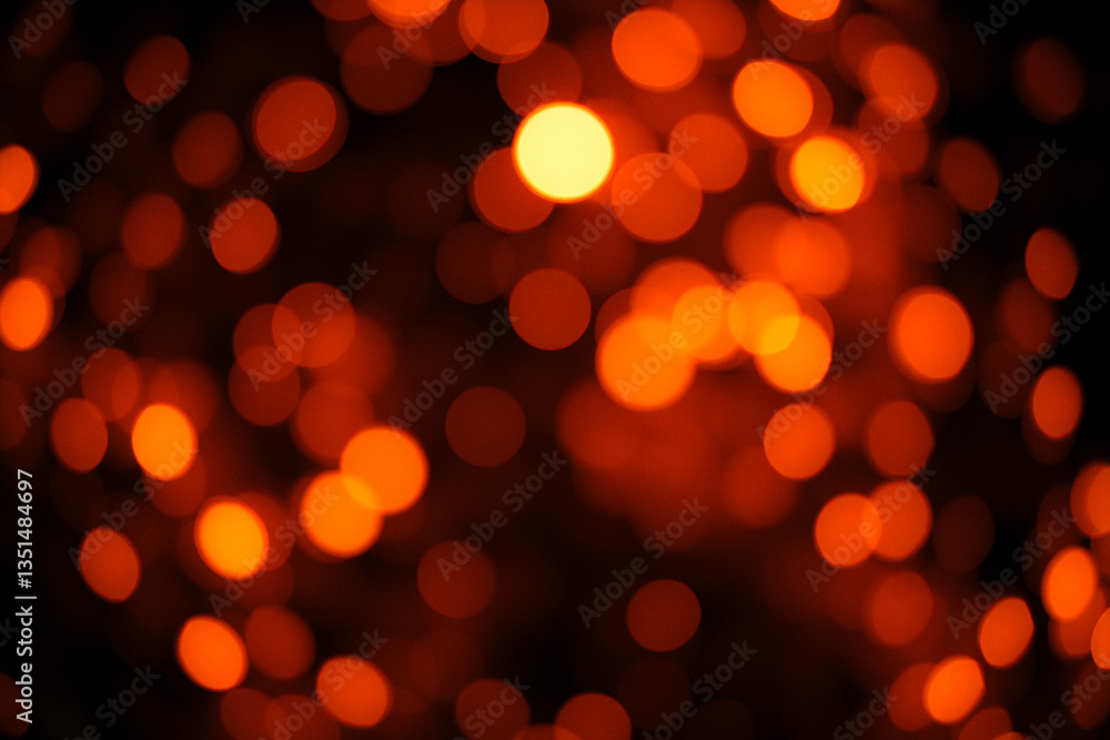 Poster Blurred orange lights create a warm bokeh effect against a dark backdrop.  The image evokes a soft, dreamy, and festive atmosphere with its glowing, abstract circles.