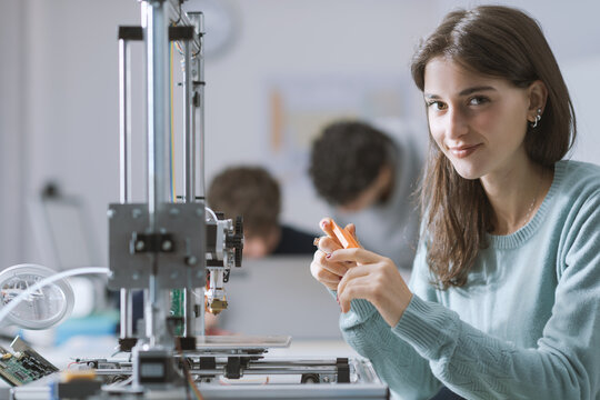 Portrait of a happy female student in the lab