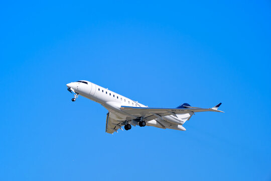 Private jet Comlux Malta Bombardier Global 6000 registration 9H-CIO taking off from Swiss Airport Z&uuml;rich Kloten on a sunny late winter day. Photo taken March 19th, 2025, Zurich Kloten, Switzerland.