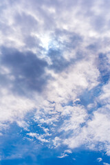 Radiant sky meets fluffy clouds. A tranquil panorama of nature's beauty, perfect for evoking peace and serenity