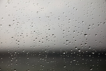 View of natural water drops on window glass