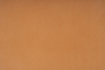 Top view of orange coral color from cow skin leather.