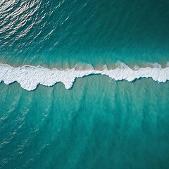 Aerial view beautiful of sea waves from drone. Stock image of blue color of ocean water, sea surface. Top view on turquoise waves, clear water surface texture.