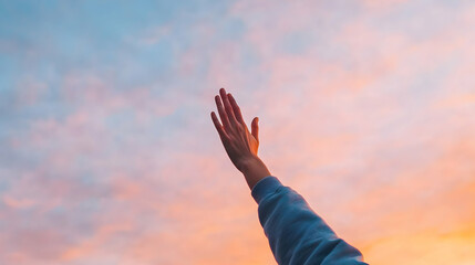 Hand reaching towards sunset sky, peaceful evening, hope concept, inspirational background, website banner