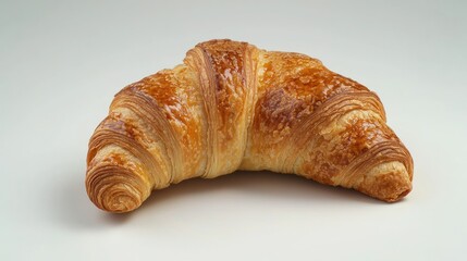 Freshly baked croissant with butter