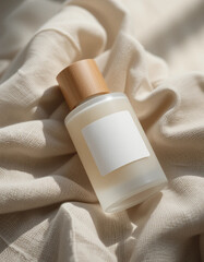 Frosted Glass Perfume Bottle on Linen Cloth - Cosmetic Product Photography.