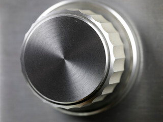 The knob, a detail of the radio station selection panel