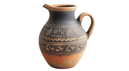 A small, decorative jug stands against a white background. The jug features a dark gray body with a light brown base and rim. It is adorned with intricate patterns around its circumference. The jug ha