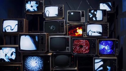 An intriguing gathering of vintage televisions presenting mesmerizing and captivating abstract visual displays