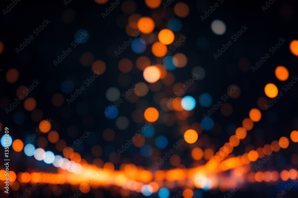 Leinwandbilder blurred lights create a vibrant bokeh effect against a dark background. orange and blue orbs form li