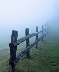 Fototapeta premium Foggy morning with a wooden fence