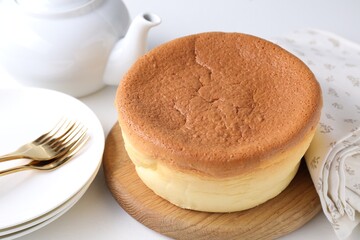 Tasty Japanese Castella sponge cake on white table, closeup