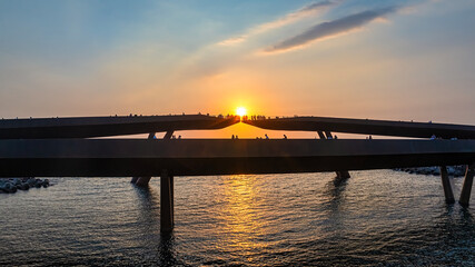 Obraz premium Kiss bridge in the sunset town attract many tourists to watch in Phu Quoc, Vietnam