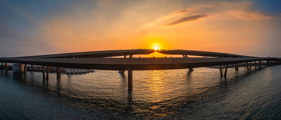 Fototapeta premium Kiss bridge in the sunset town attract many tourists to watch in Phu Quoc, Vietnam