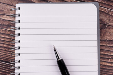 Notebook with fountain pen flat lay