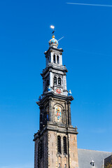 Fototapeta premium Restored and painted Westertoren tower of the Westerkerk church in Amsterdam, Noord-Holland, The Netherlands, Europe