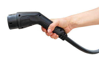 Cutout black electric vehicle charging connector in female hand. 