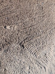 Soil or Mud! Brown ground surface, Close up natural background. Soil wall texture of clay house structure.
Fine beach sand, Soil wall of clay house structure, mud background. Vintage tone.
