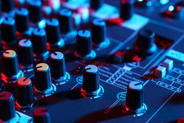 Professional mixing console, closeup. Radio studio equipment