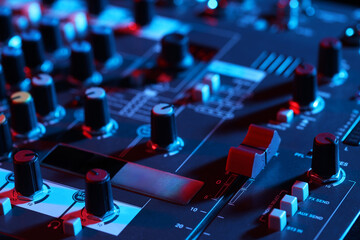 Obraz premium Professional mixing console, closeup. Radio studio equipment