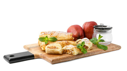Tasty apple strudels with powdered sugar, fruits and mint isolated on white