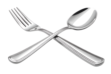 A pristine silver spoon and fork intertwined ready for an elegant dinner setting the stage for a memorable meal with a clean black background showing sharp reflections and polished metal textures.