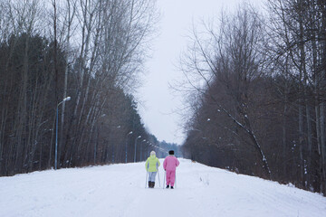 pensioners walk in the park and play sports in winter