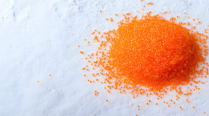 Orange sugar sprinkles on white background; baking, cooking ingredient; food photography, recipe website